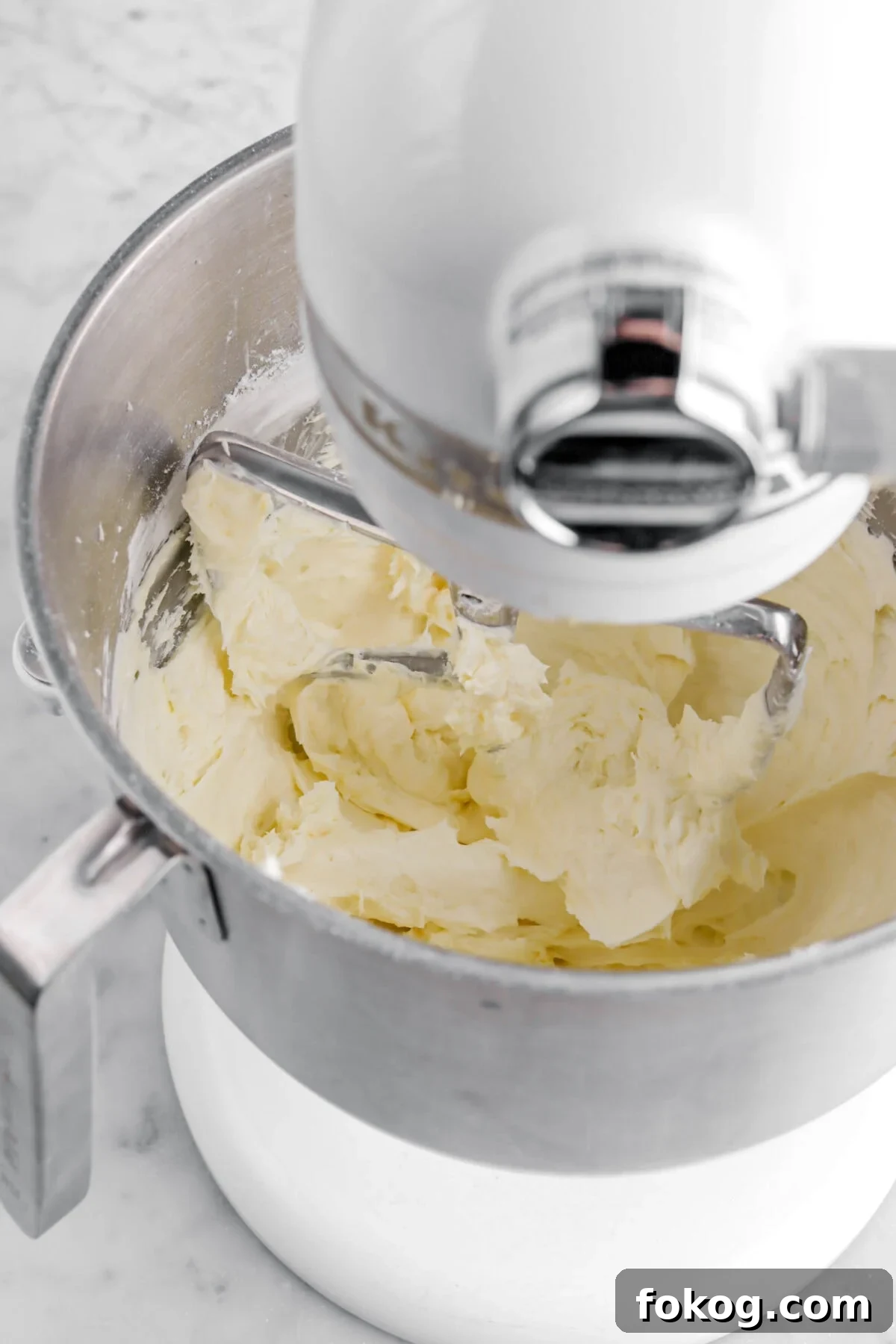Classic Vanilla Cake with Smooth Buttercream Frosting 15 vanilla buttercream in stand mixer.
