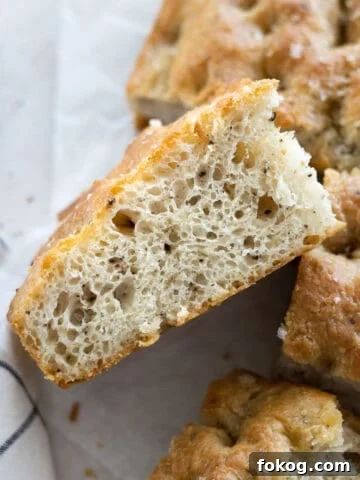 Side view of a slice of Black Pepper Focaccia.