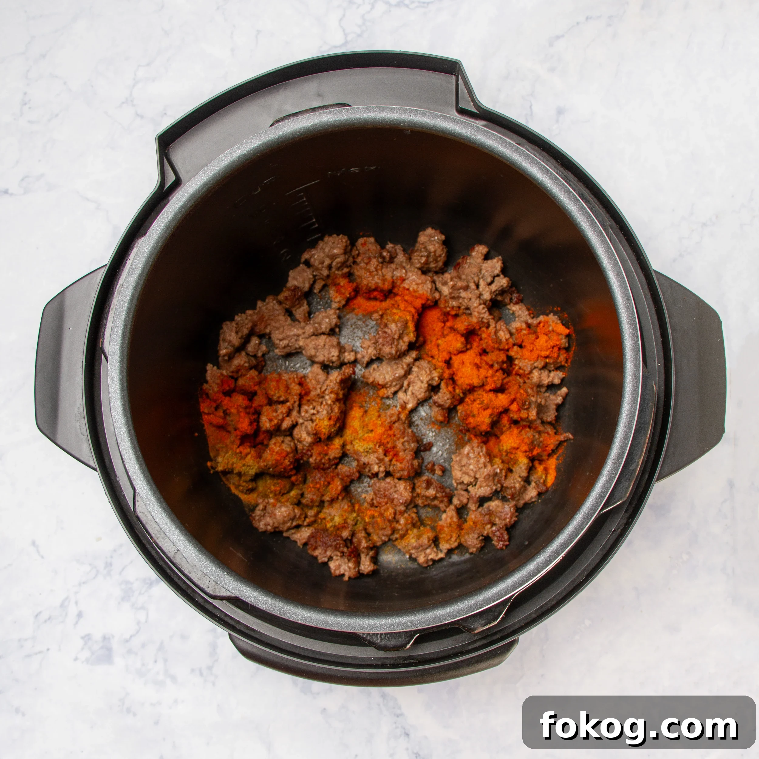 Cowboy Soup: Hearty Comfort Soup Recipe for Cozy Nights 5 Sautéing the ground beef in the Instant Pot.