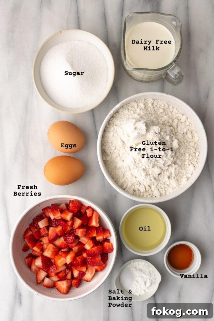 Gluten-Free Strawberry Muffins Recipe with Moist, Tender Crumbs 3 Ingredients for gluten free strawberry muffins on a white table.