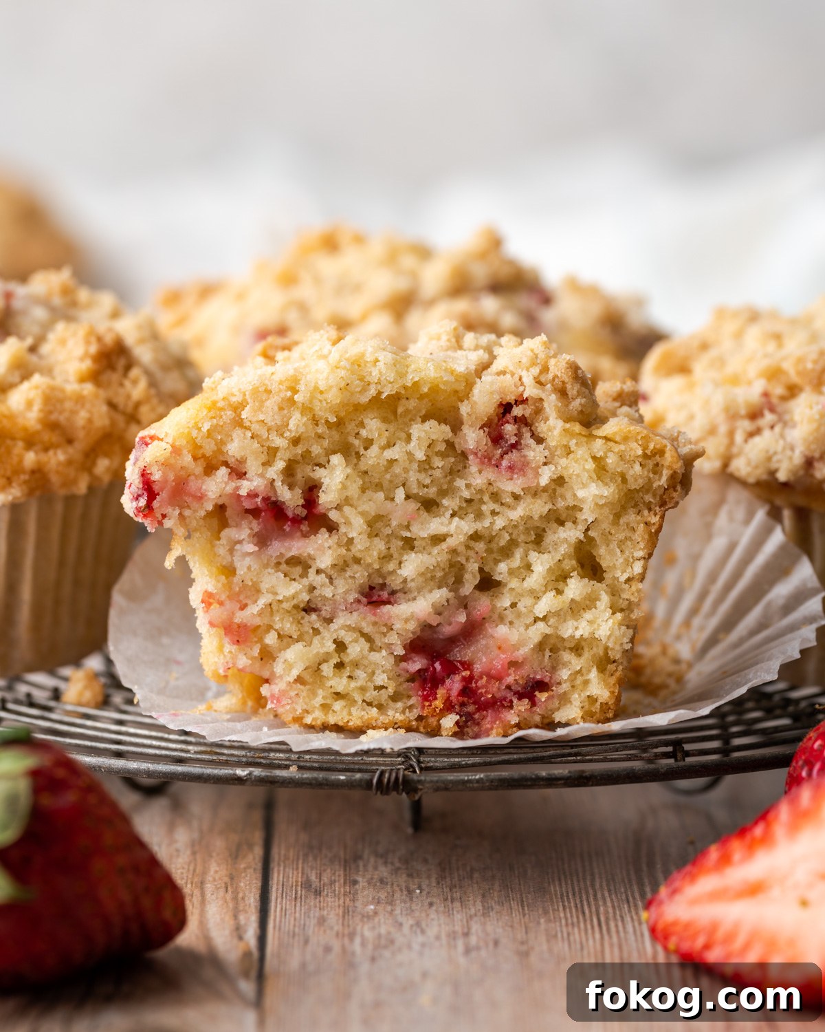 Gluten-Free Strawberry Muffins Recipe with Moist, Tender Crumbs 4 Inside of a gluten free strawberry muffin that has been sliced in half.