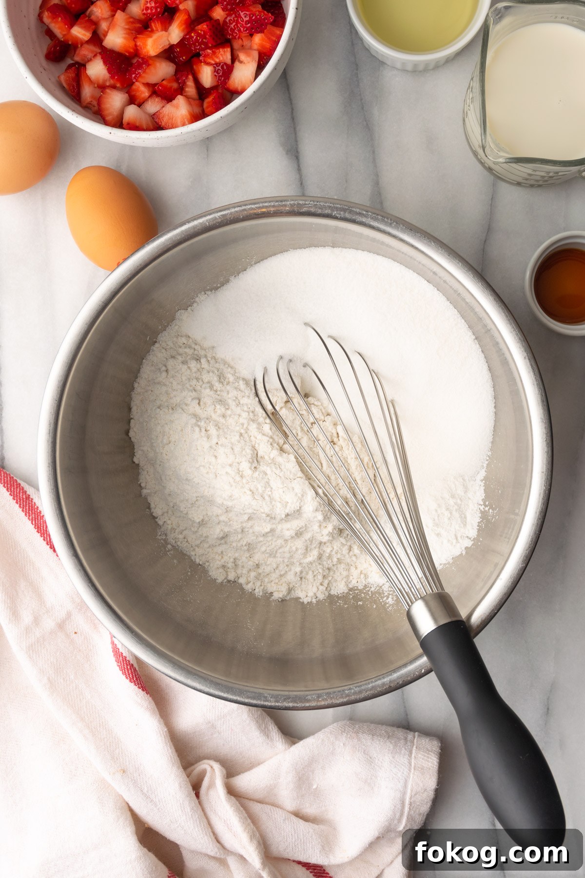Gluten-Free Strawberry Muffins Recipe with Moist, Tender Crumbs 5 Gluten free flour, baking powder, salt and sugar in a large metal mixing bowl.
