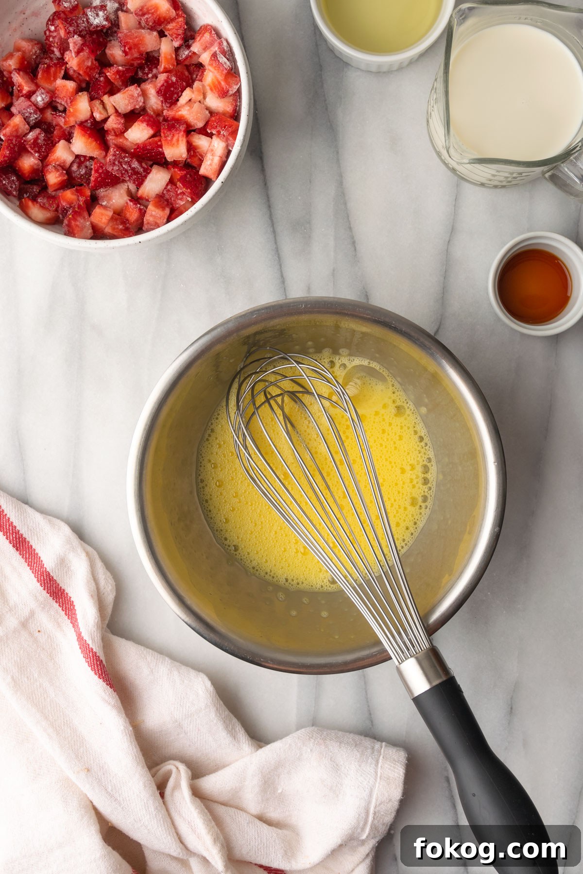 Gluten-Free Strawberry Muffins Recipe with Moist, Tender Crumbs 6 Whisked eggs in a small metal mixing bowl.