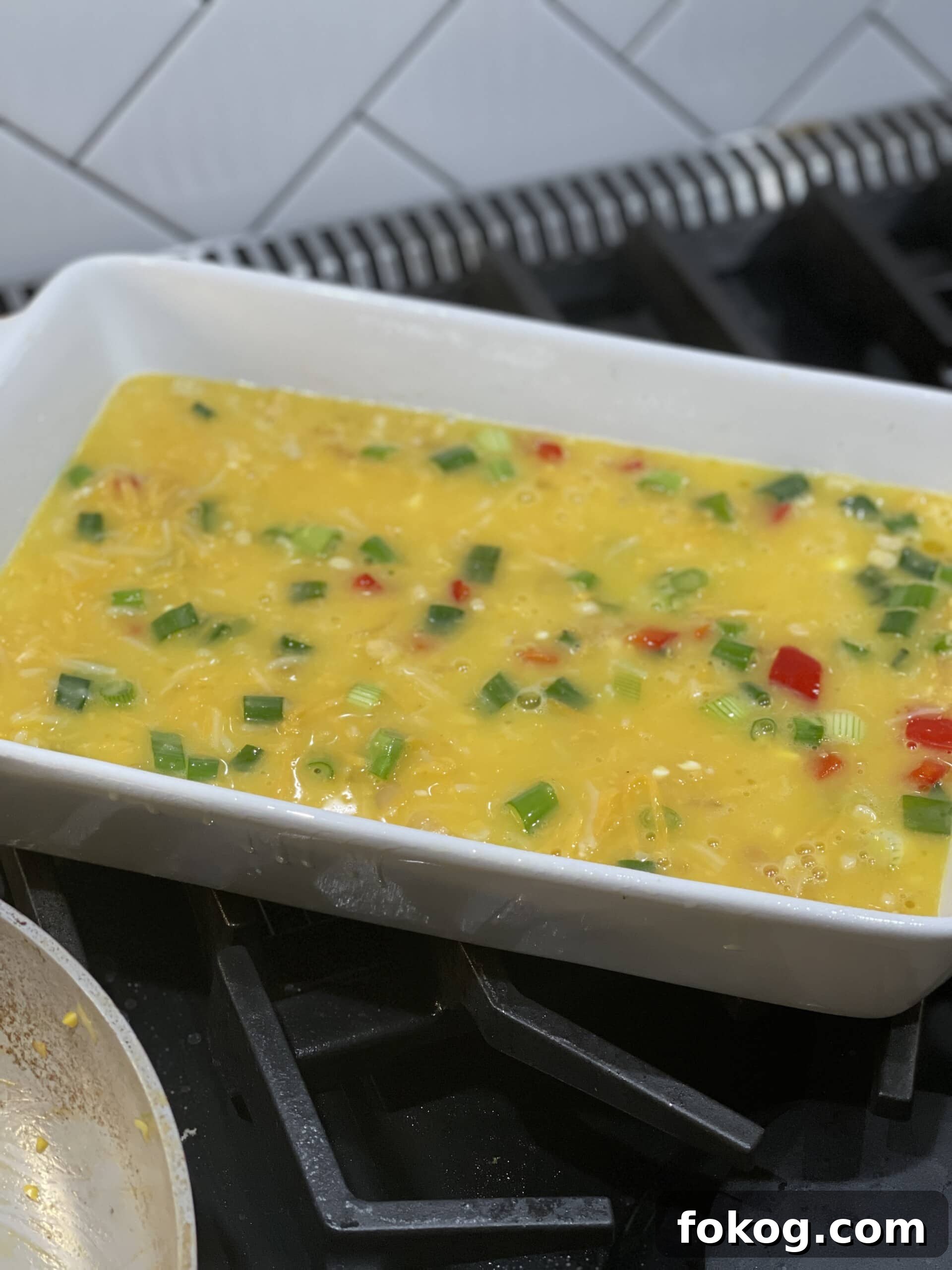 Cheesy Corn and Egg Casserole with Sharp Cheddar 13 assembled egg bake ready for oven