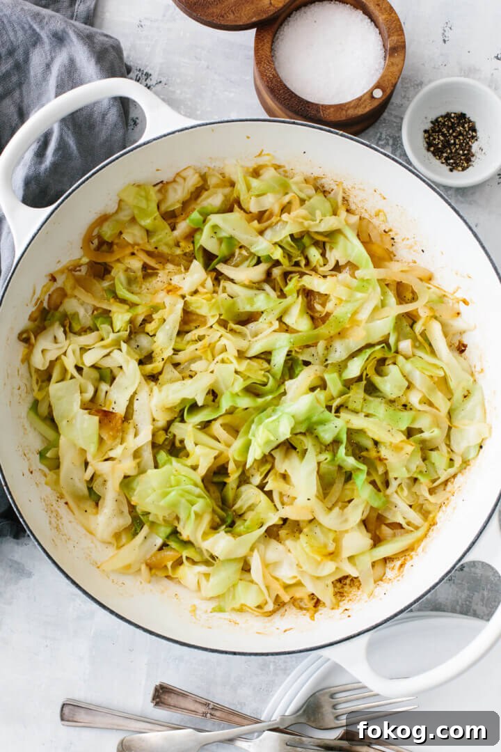 40+ Low-Carb Recipes for Weight Loss and Blood Sugar Control 12 Sauteed cabbage in a pan on a table.