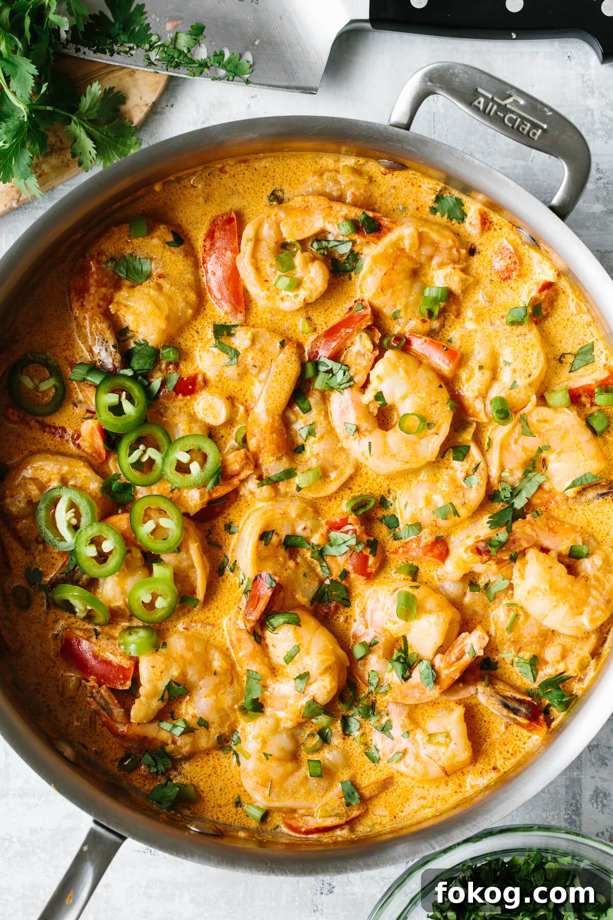 40+ Low-Carb Recipes for Weight Loss and Blood Sugar Control 13 Creamy chipotle shrimp in a saute pan with garnish.