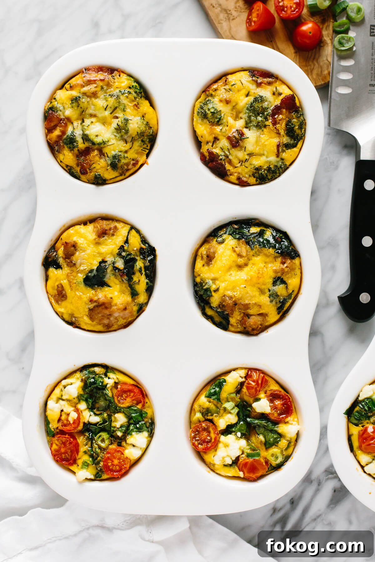 40+ Low-Carb Recipes for Weight Loss and Blood Sugar Control 16 Egg muffins in a muffin pan.