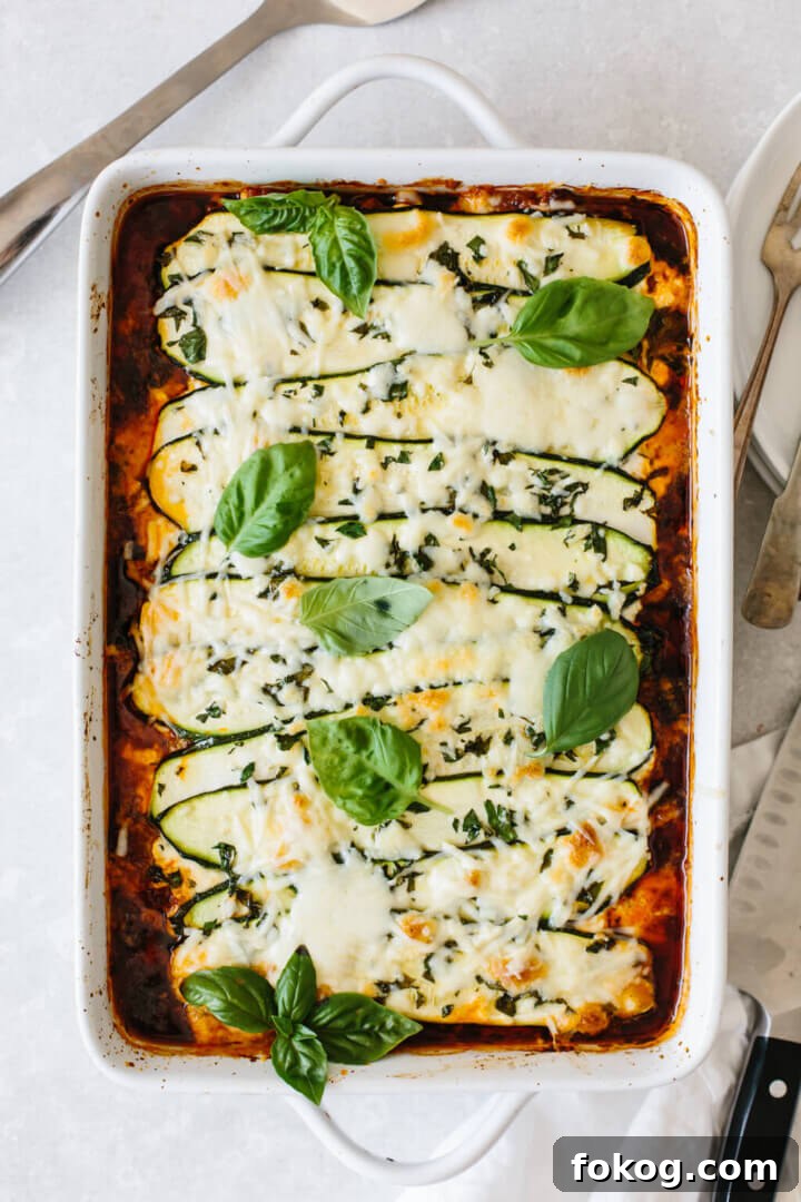 40+ Low-Carb Recipes for Weight Loss and Blood Sugar Control 8 Zucchini lasagna in a white casserole dish.