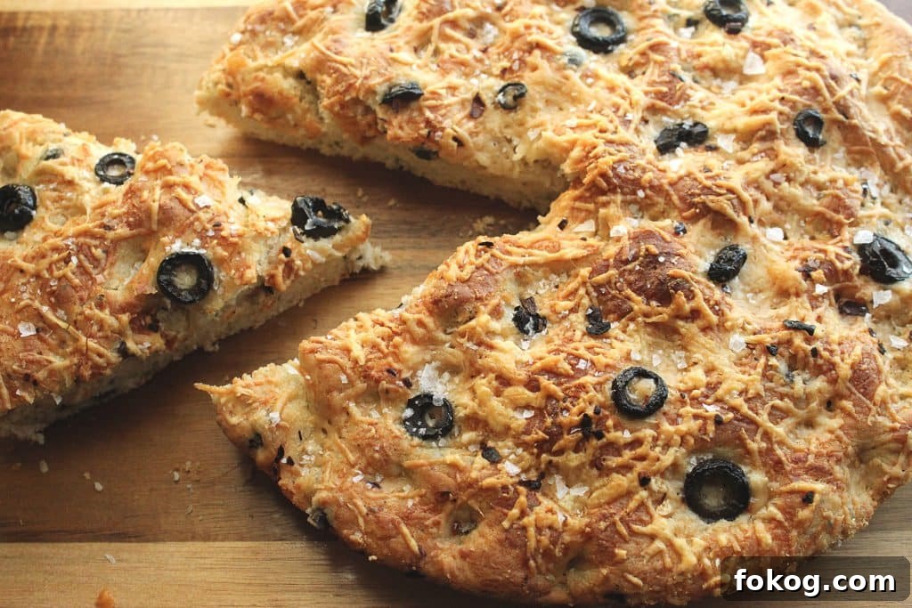 Parmesan and Black Olive Focaccia: Crispy Herb Flatbread Recipe 2 Easy Skillet Black Olive and Parmesan Focaccia Bread Recipe | Chenée Today