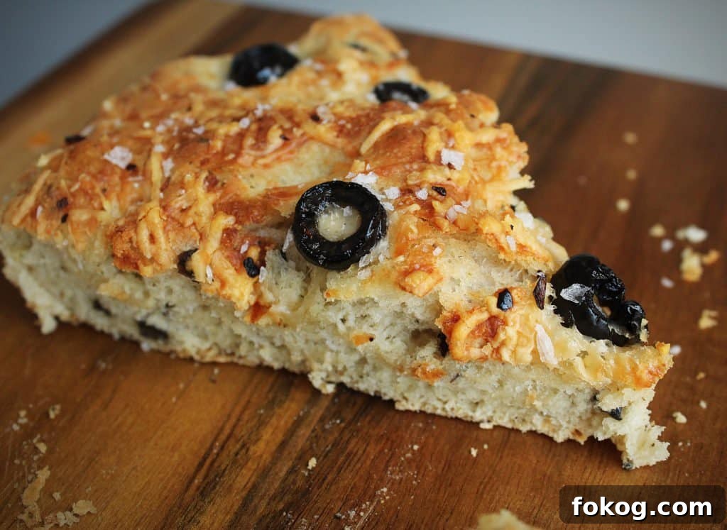 Parmesan and Black Olive Focaccia: Crispy Herb Flatbread Recipe 3 Easy Skillet Black Olive and Parmesan Focaccia Bread Recipe | Chenée Today