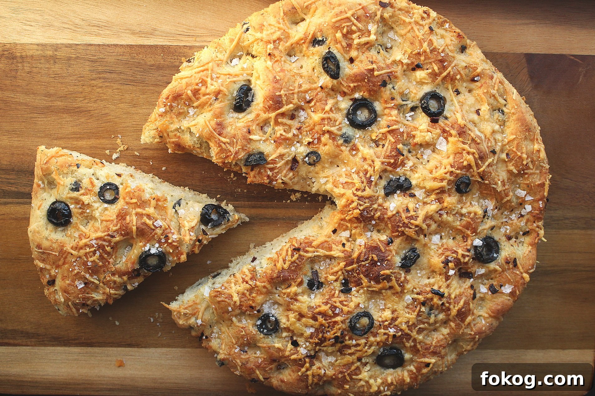 Parmesan and Black Olive Focaccia: Crispy Herb Flatbread Recipe 5 Easy Skillet Black Olive and Parmesan Focaccia Bread Recipe | Chenée Today