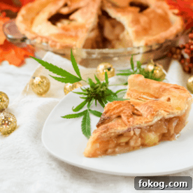 A white plate topped with a slice of cannabis apple pie