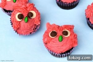 Adorable Owl Cupcake Recipe and Decorating Ideas 7 Owl Cupcakes are soft and fluffy chocolate cupcake decorated with a vanilla buttercream to look like gorgeous, googly eyed owls! Perfect for a birthday cake, party, get together or just for fun. #owlcupcakes #pinkowl