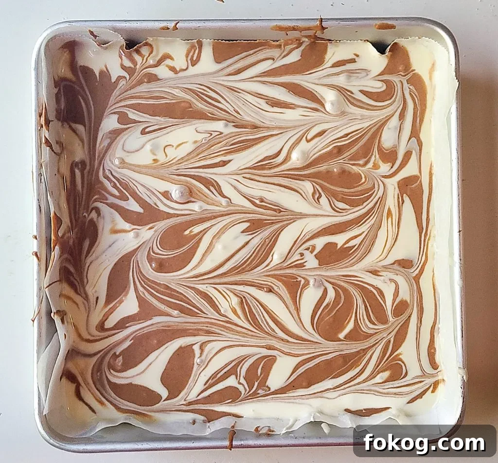 adding the marble effect to the cheesecake bars