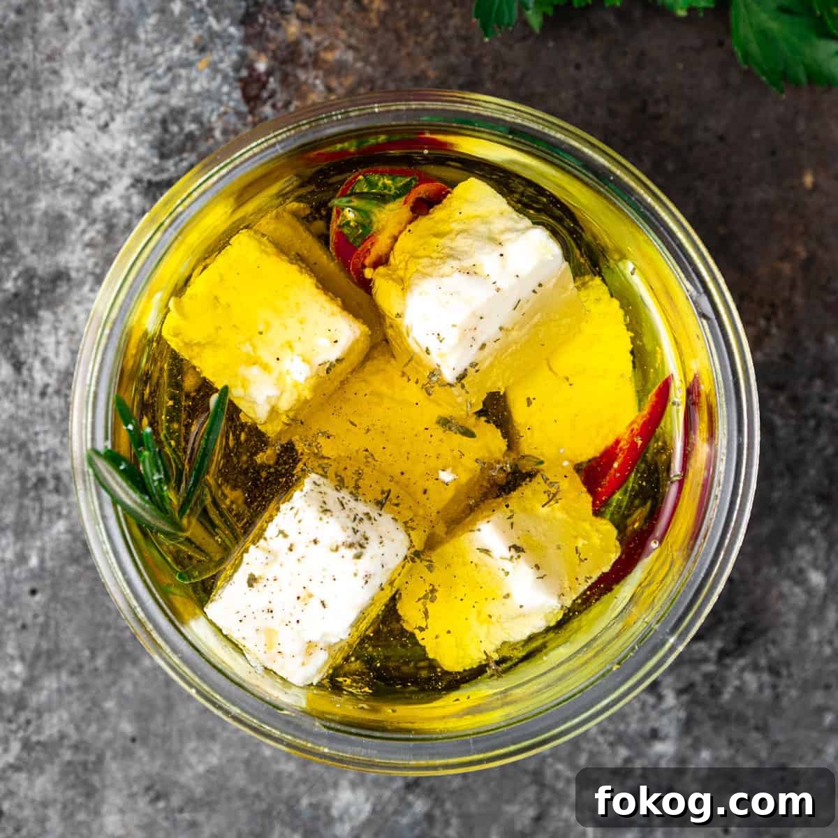 Herbed and Chili-Marinated Feta: Flavorful Appetizer Recipe 2 close up image: feta cheese appetizer in glass jar