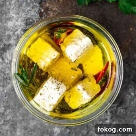 Herbed and Chili-Marinated Feta: Flavorful Appetizer Recipe 7 close up image: feta cheese appetizer in glass jar
