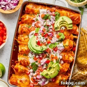 Chicken and Black Bean Enchiladas with Tangy Salsa Verde 17 Chicken and black bean enchiladas with toppings in a casserole dish