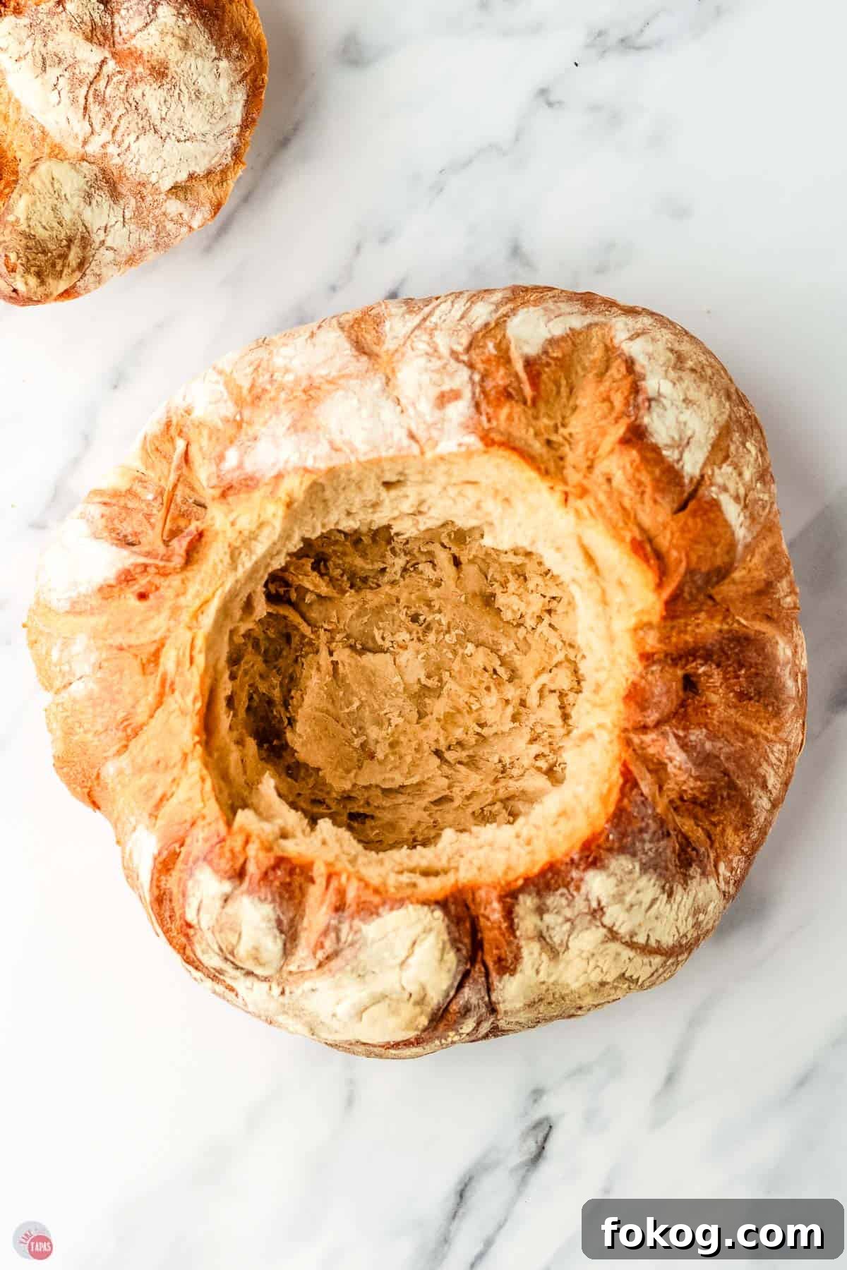 bread boule cut into a bowl