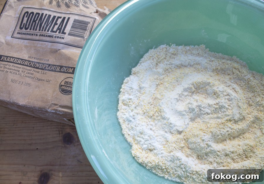 Cornmeal-Crusted Fish Fingers with Skillet Succotash Recipe 9 Dip the pieces into organic cornmeal and gluten- free flour, and some cajun spices. (can use regular flour)