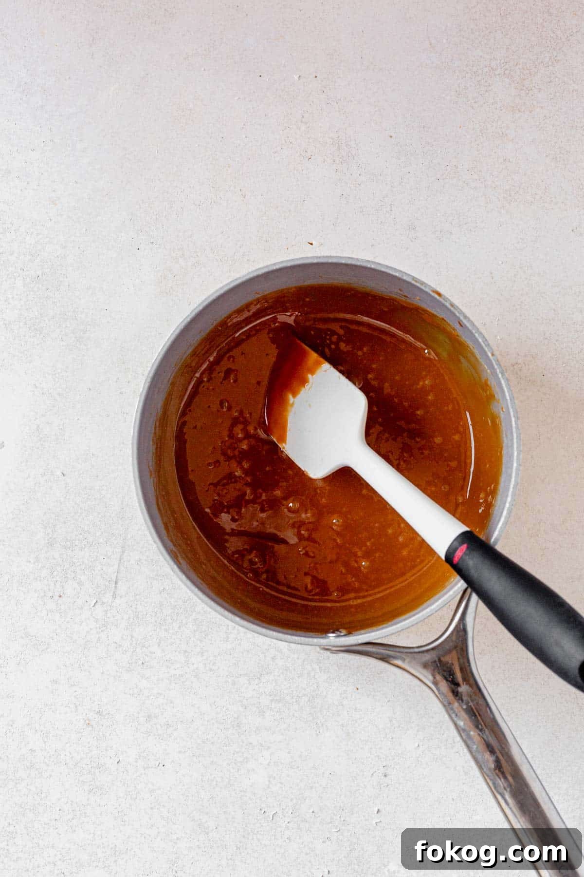 Millionaire Cookie Recipe: Caramel Shortbread Bars Tutorial 7 caramel melted in a bowl.
