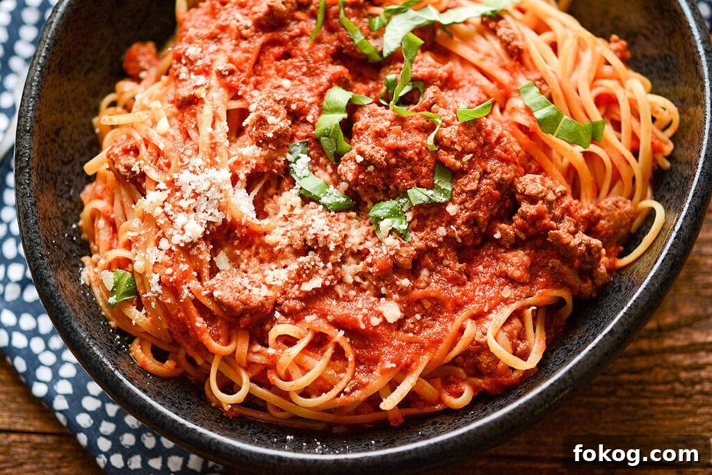 Slow Cooker Bolognese No need to stand over the stove while stirring all day long! Impress your family or dinner guests with this delicious Slow Cooker Bolognese that's so easy to make while still being so full of rich flavors.