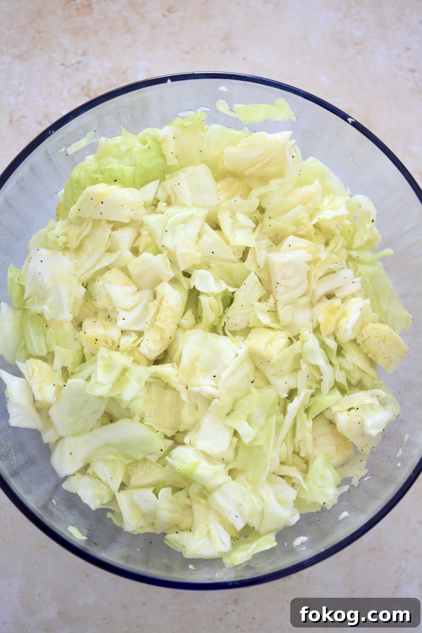 chopped cabbage in mixing bowl.