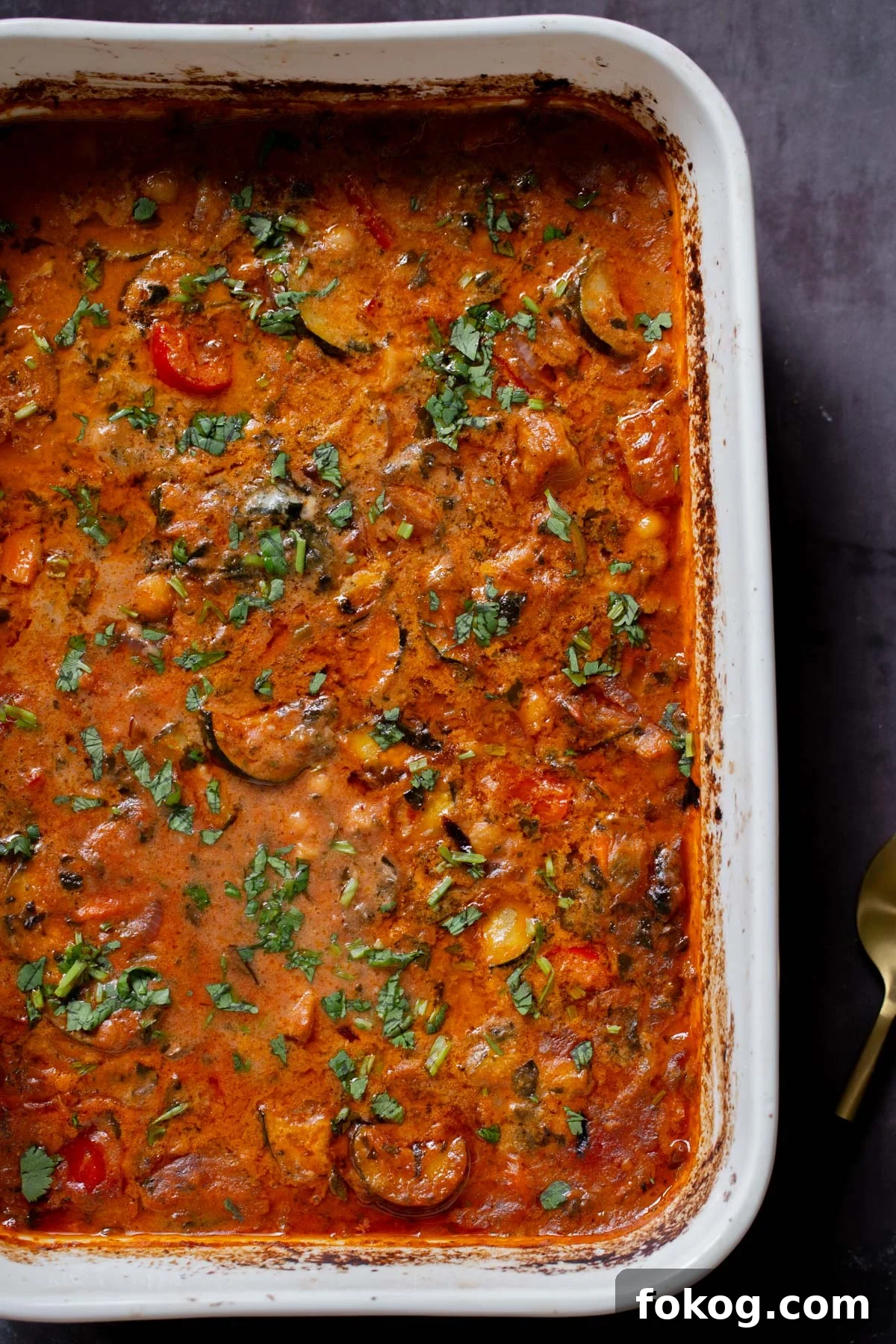 zucchini chickpea curry in the pan after baking