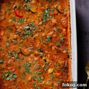 zucchini chickpea curry in the pan after baking