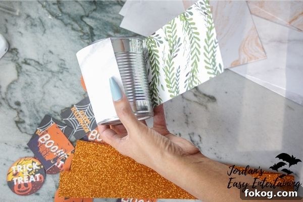 Halloween Can Toss Game with Free Printable Targets 5 Decorated cans ready to stack