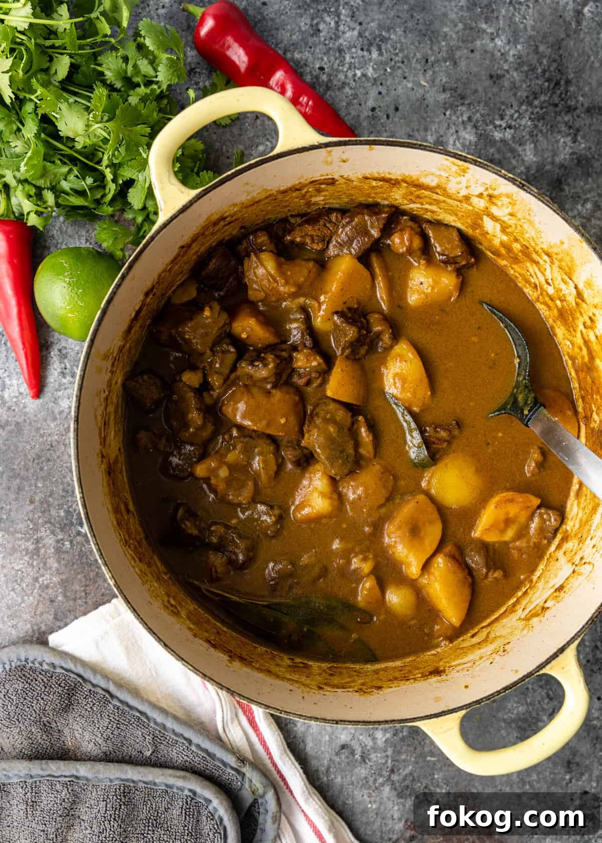 Creamy Coconut Beef Curry with Aromatic Spices 5 beef curry in dutch oven pot