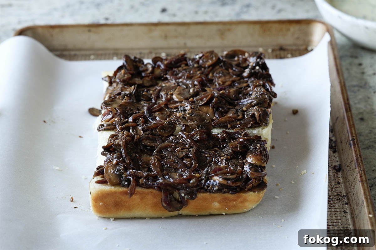 mushroom mixture spread onto the dinner rolls