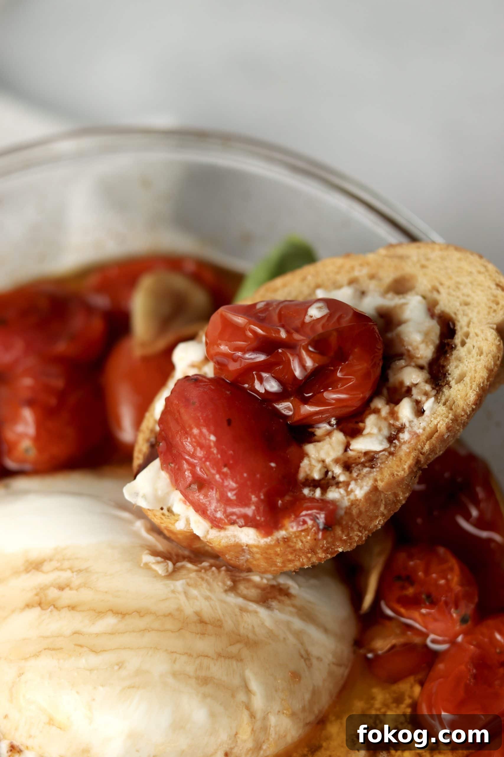 Crostini with tomatoes, burrata, and balsamic glaze