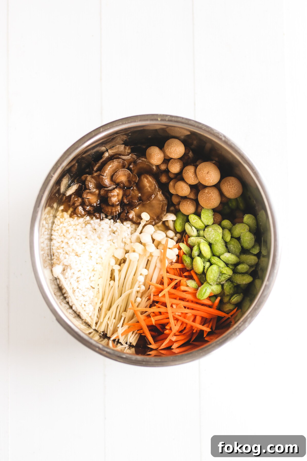 Obachan’s Mushroom Kamameshi: Authentic Japanese Mixed Rice Recipe 3 recipe ingredients in a silver bowl
