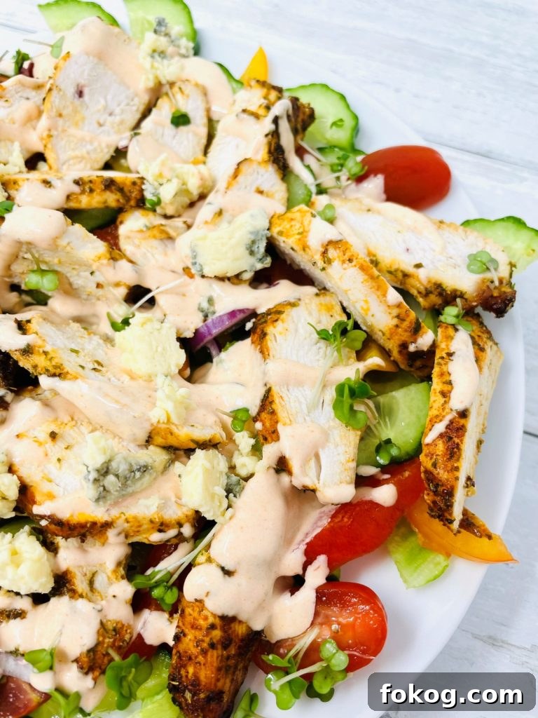 Light Summer Dinner Ideas: Quick Recipes for Warm Evenings 3 Buffalo Chicken salad on a white plate with a white background
