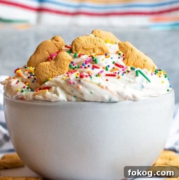 Straight on shot of dunkaroo dip in a white bowl on a white counter.