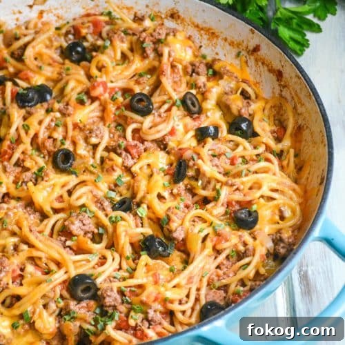taco spaghetti in a large blue skillet