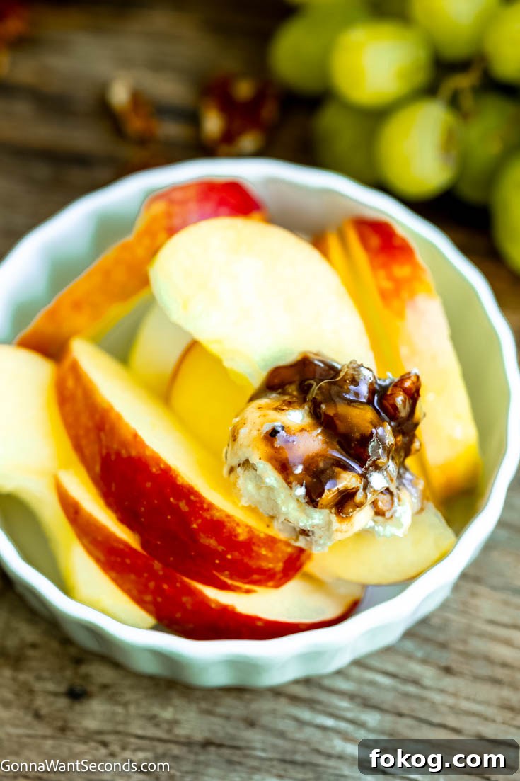 a dollop of no bake pecan pie dip on apple slices