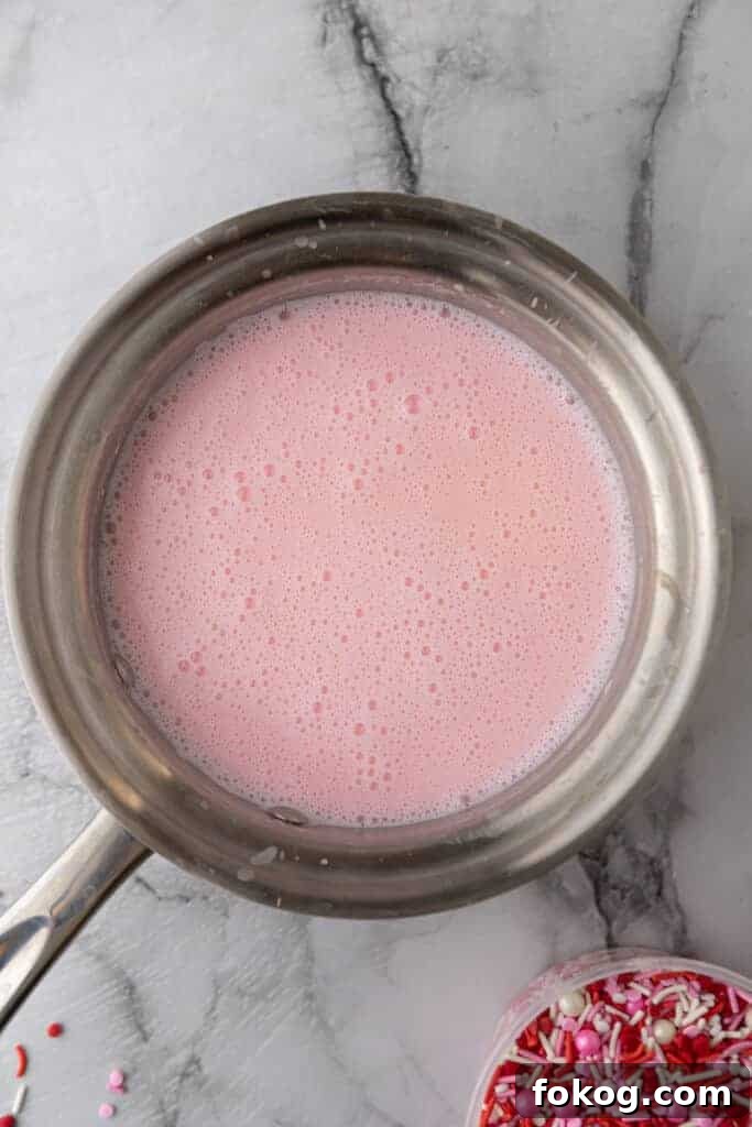 Pink hot chocolate in a pot