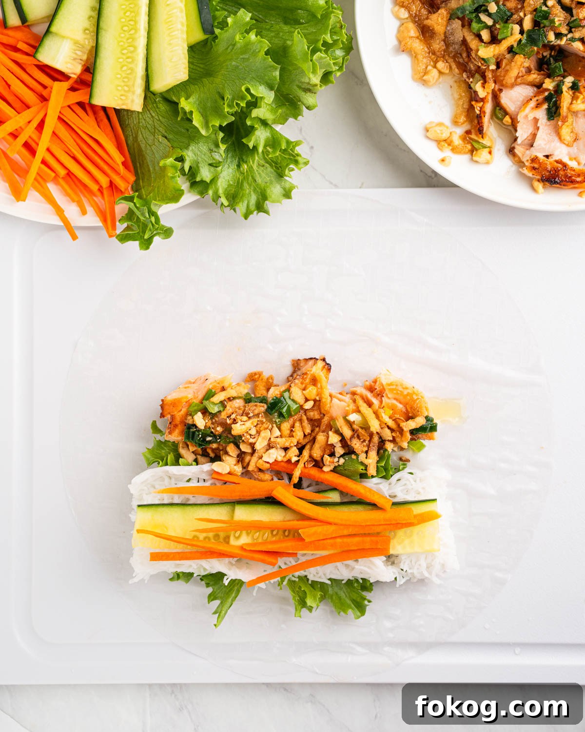 ingredients for salmon spring roll on rice paper.