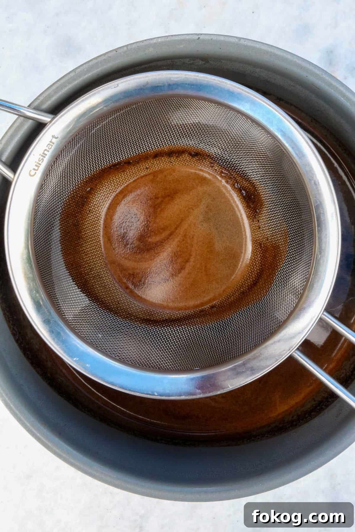 Mesh strainer in a pot to strain coffee
