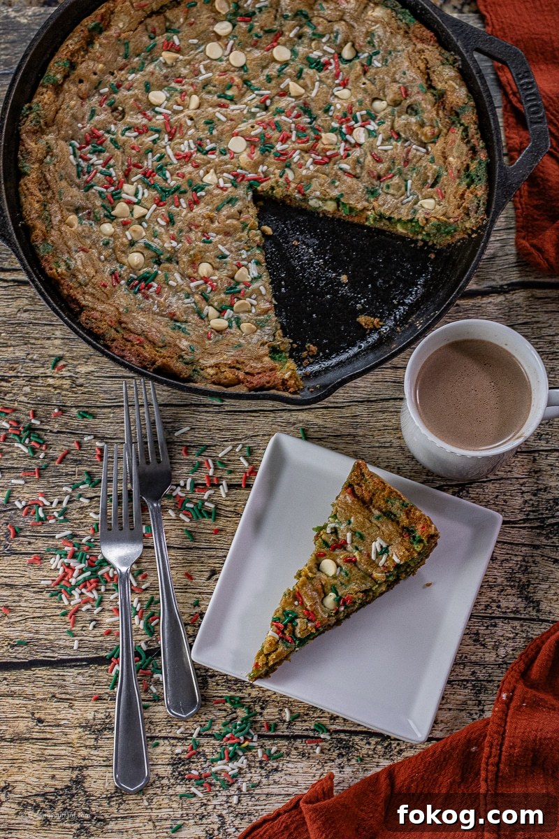 Cast Iron Skillet Christmas Sprinkle Cookies: Festive Holiday Recipe 2 giant sugar cookie with Christmas sprinkles baked in a cast iron skillet