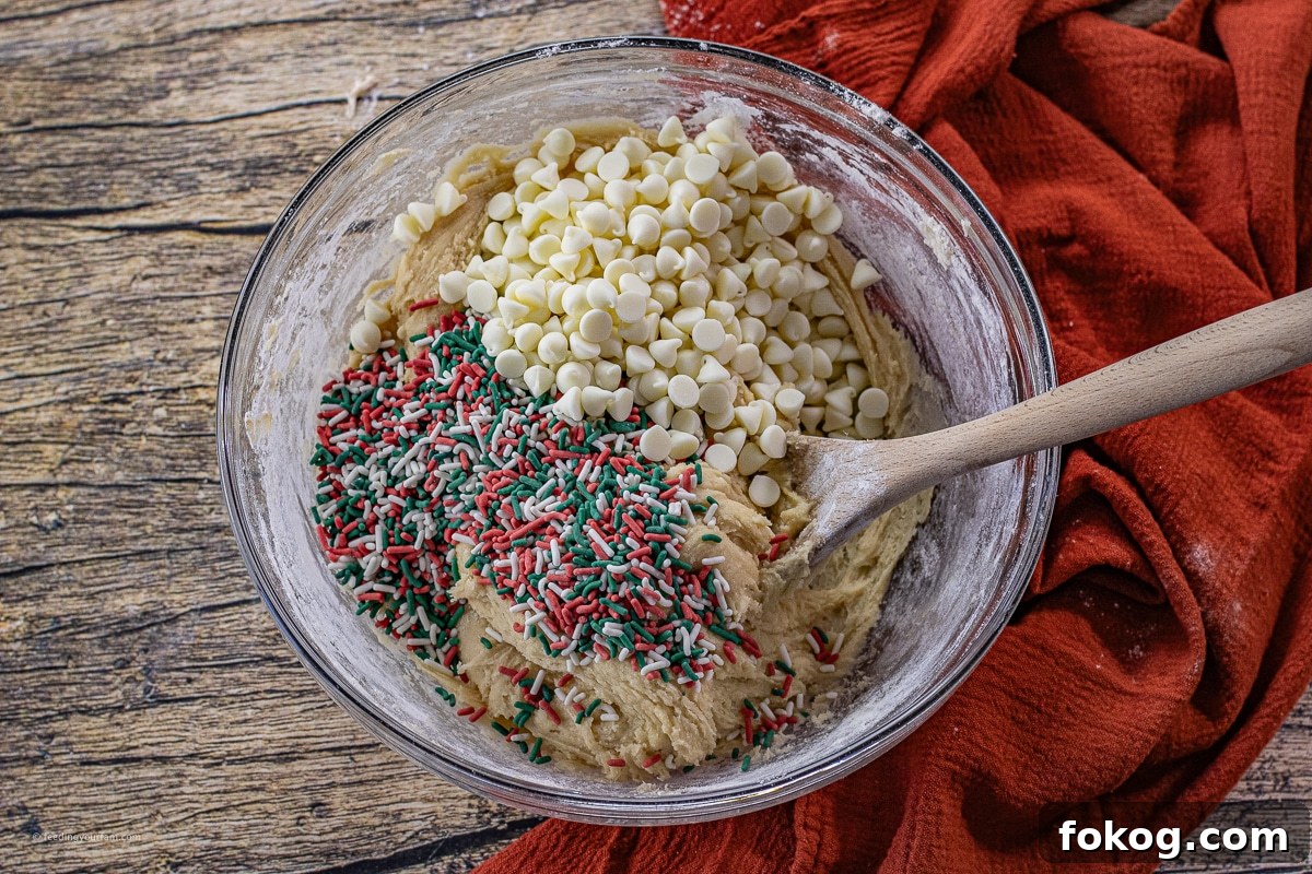 Cast Iron Skillet Christmas Sprinkle Cookies: Festive Holiday Recipe 5 bowl of cookie dough with red and green sprinkles and white chocolate chips