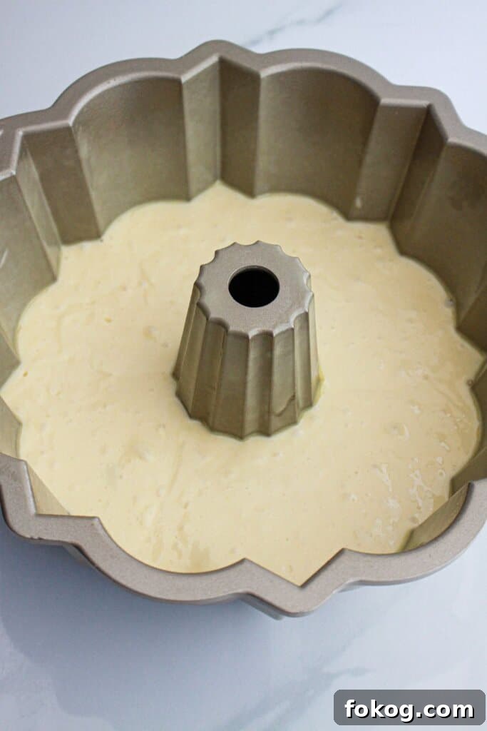 cake butter in a bundt cake pan.