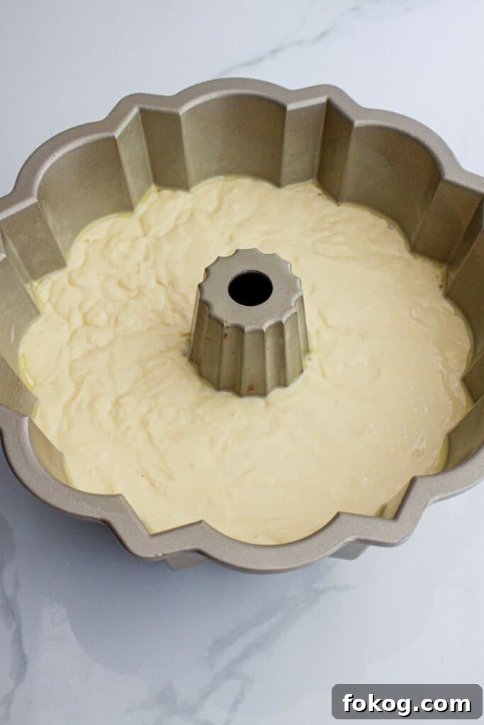 cake batter in a bundt cake pan ready for the oven.