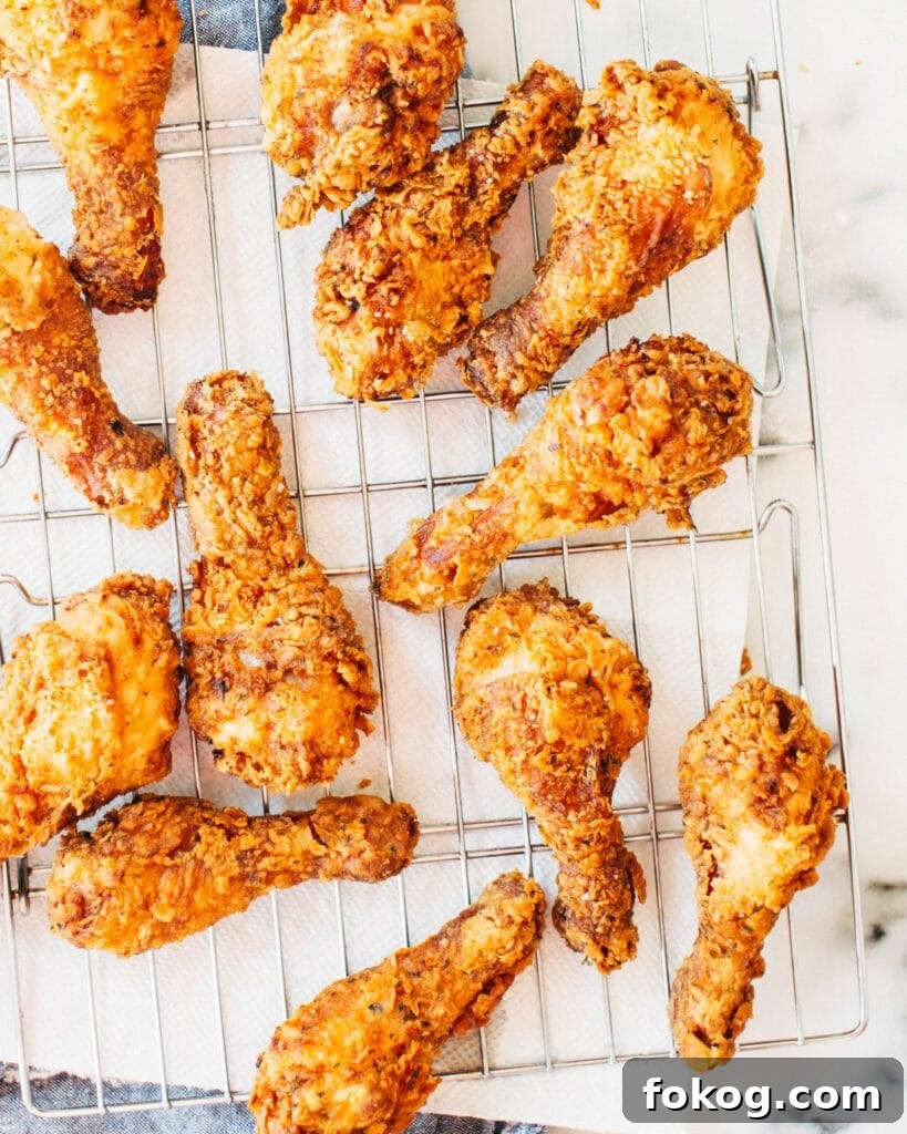 41 Juicy Chicken Drumstick Recipes You’ll Want Tonight 4 Crispy Buttermilk Fried Chicken on a wire rack