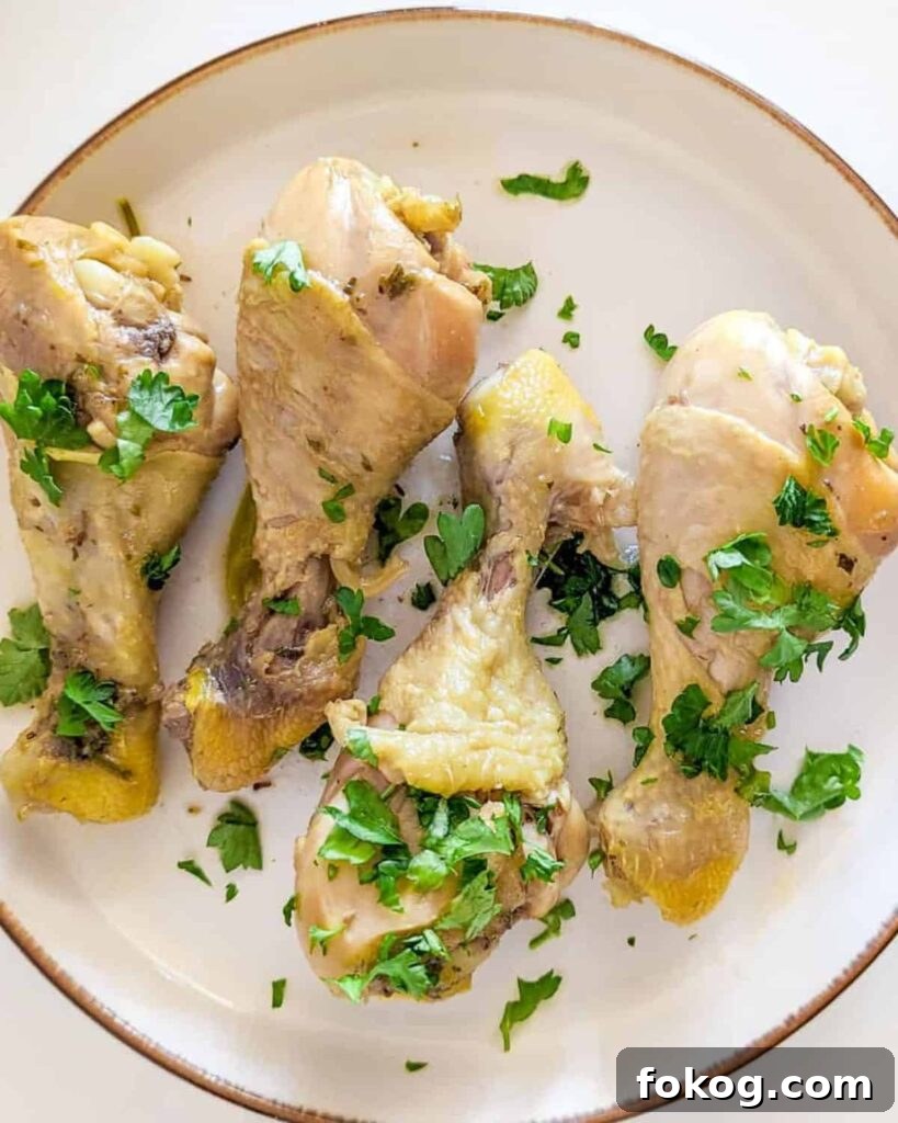 41 Juicy Chicken Drumstick Recipes You’ll Want Tonight 32 Boiled Chicken Drumsticks on a white plate