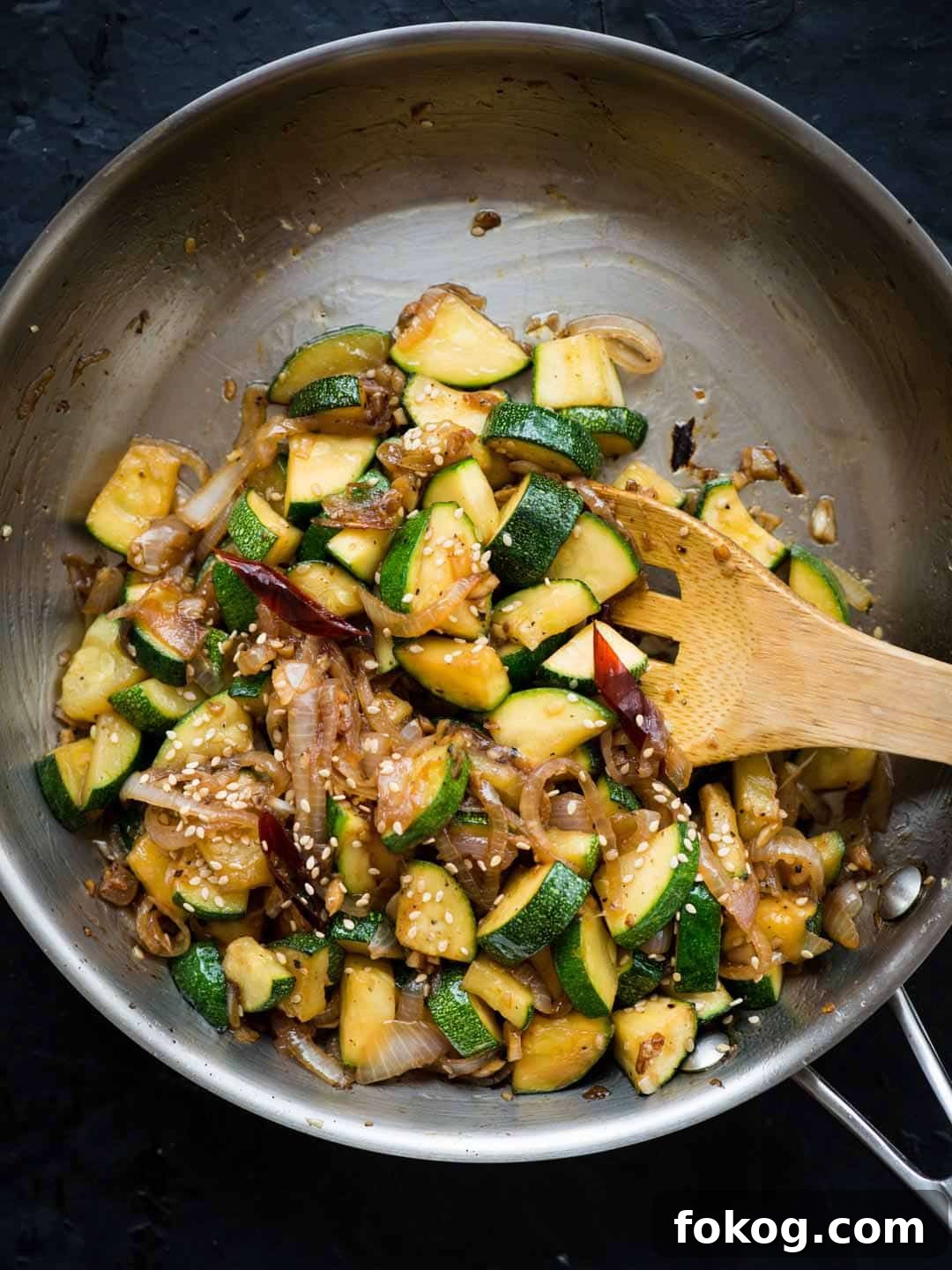 Flavor-packed Zucchini Stir Fry ready in minutes: onion, garlic and zucchini tossed in a simple sauce.