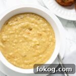 A close up view of a bowl of vegan split pea soup.