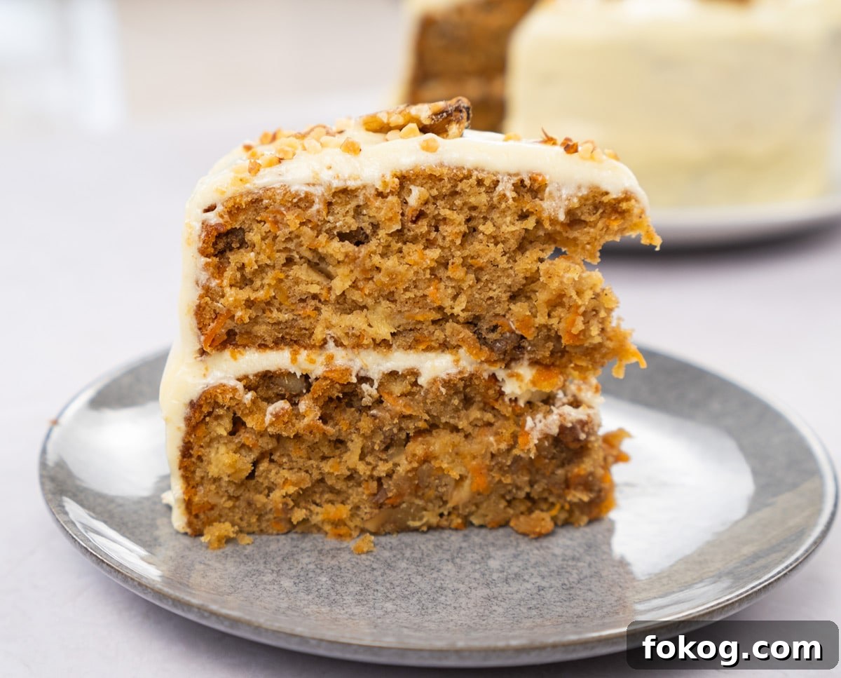Carrot cake with pineapple on a plate.
