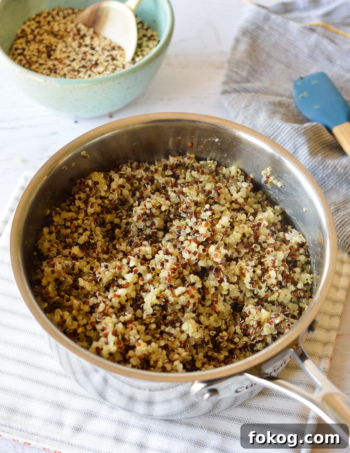 How to Cook Tri-Color Quinoa: Perfect Fluffy Results 6 a saucepan full of cooked quinoa.